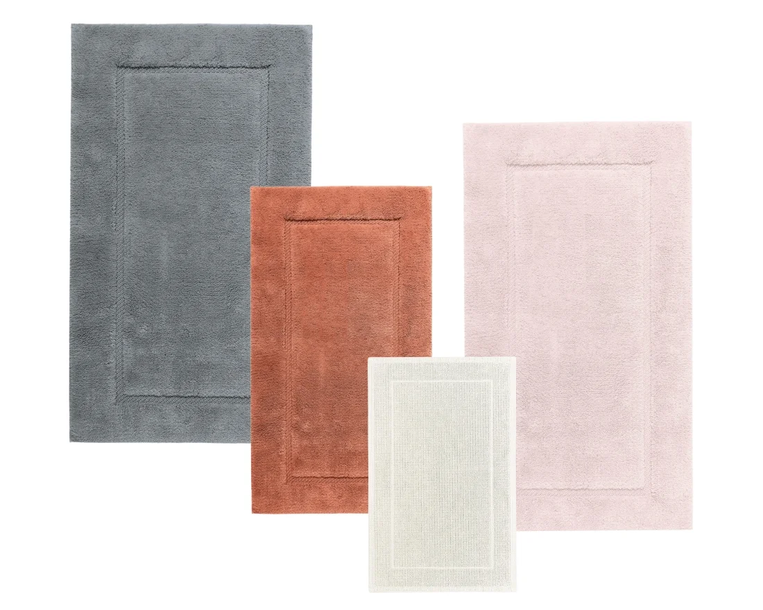 Egoist bath rugs and mats