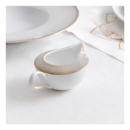 Raynaud, Oskar, Creamer