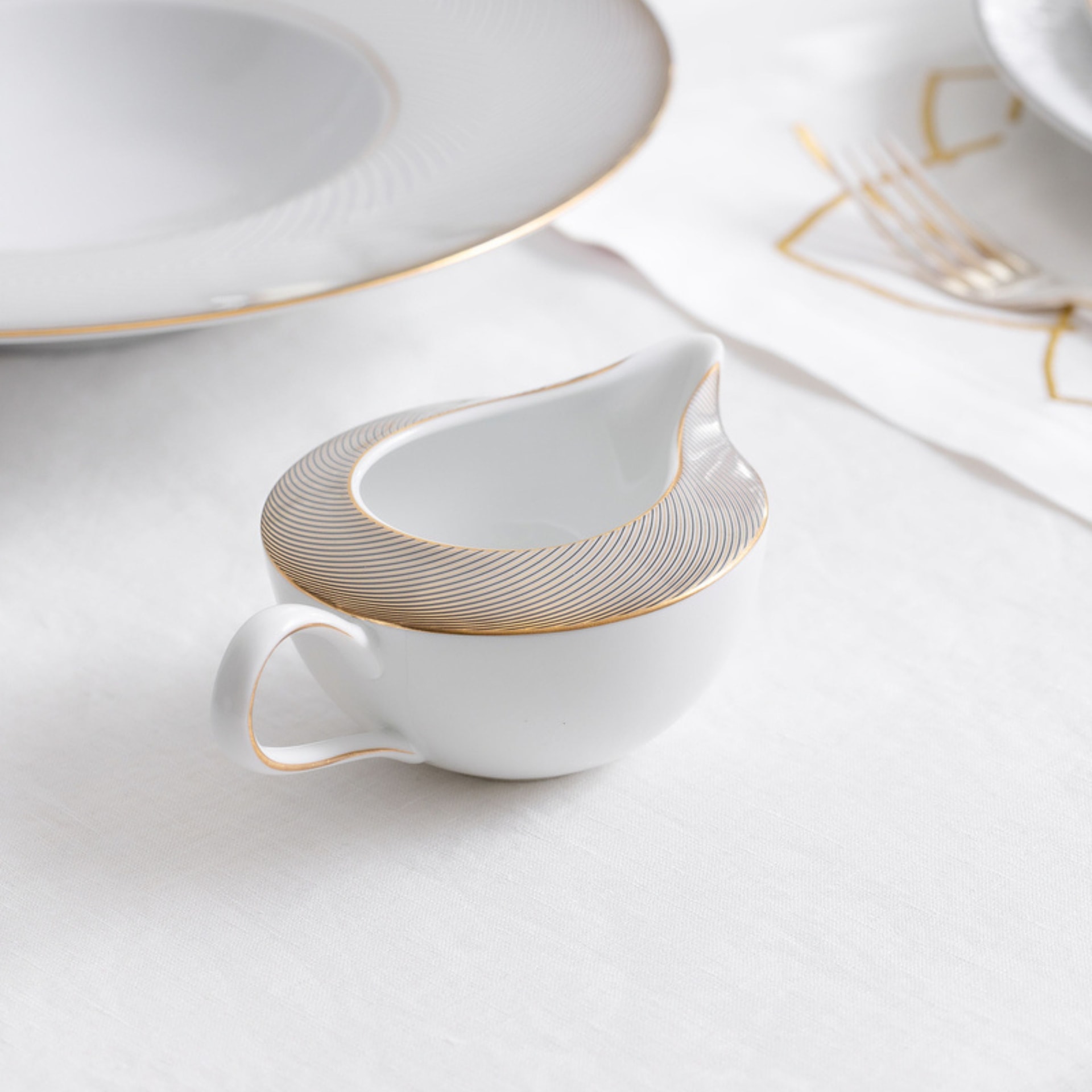 Raynaud, Oskar, Creamer